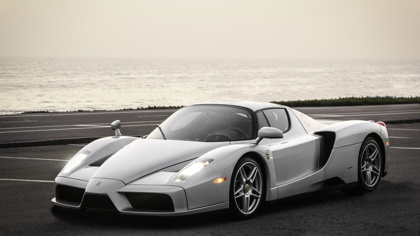 Download Wallpaper 1366x768 Ferrari, Enzo, Silver, Sea, Background