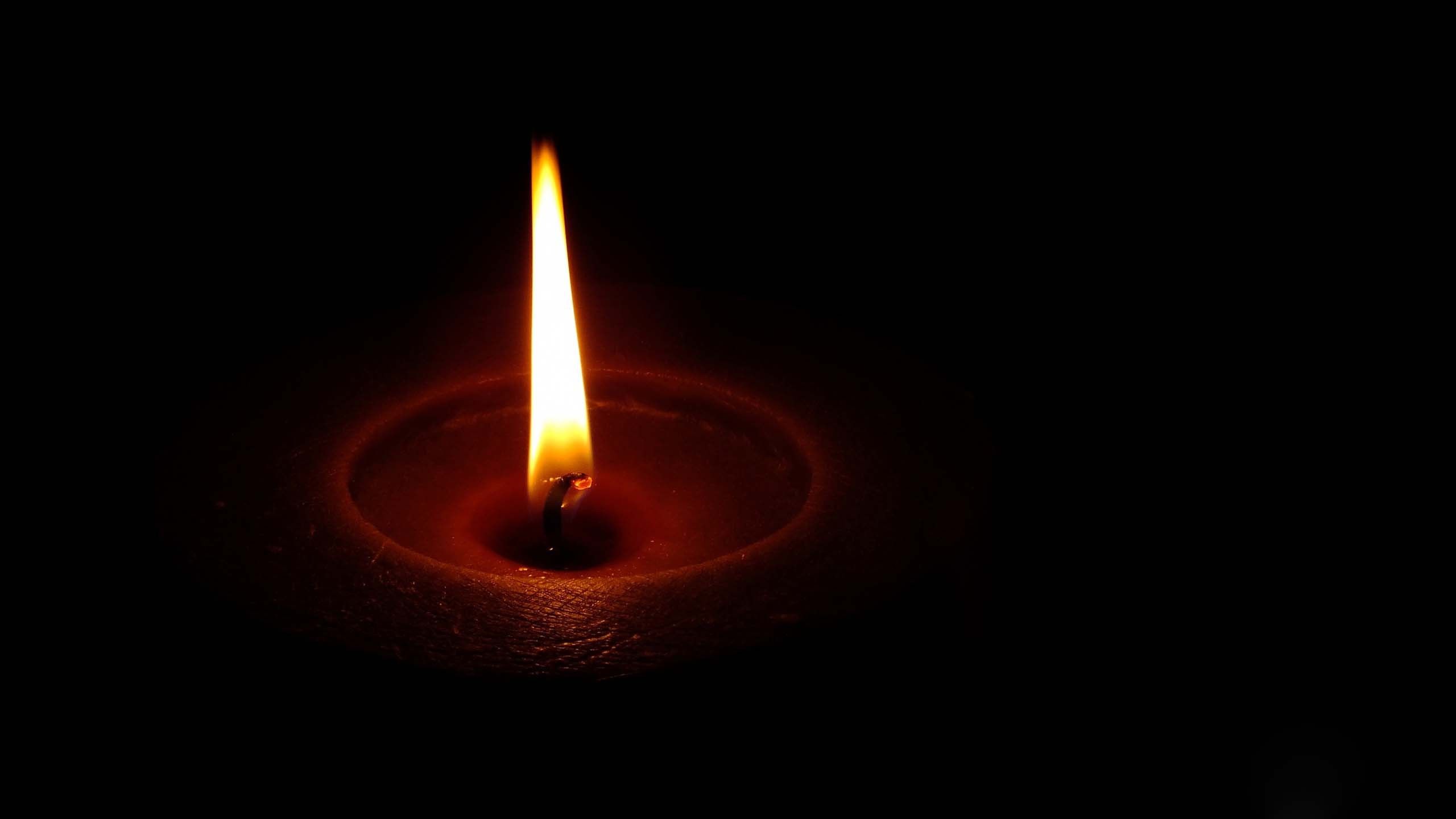 The light of the candle in the dark wallpapers and images