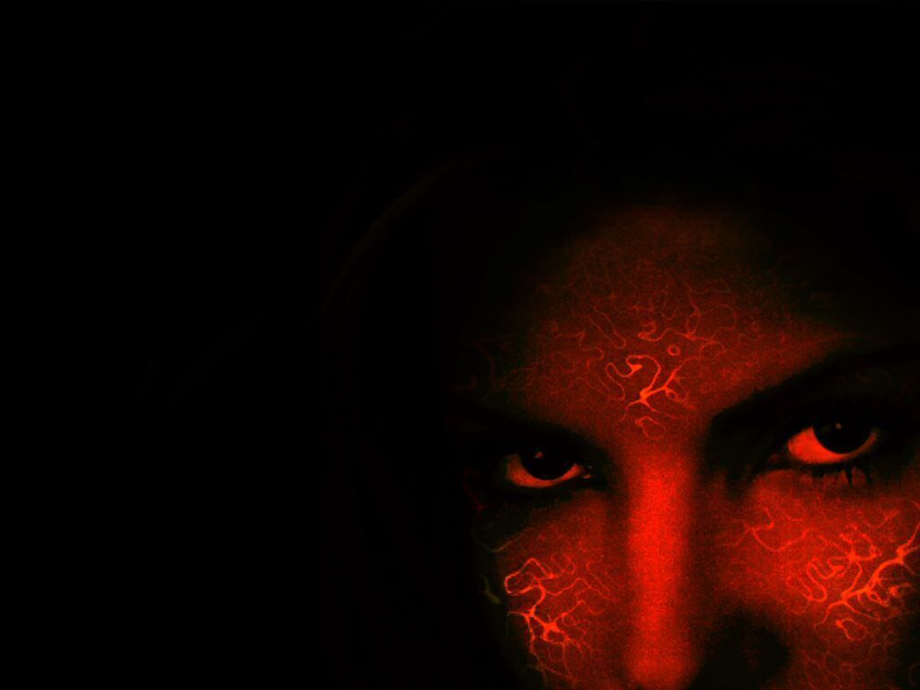 Free desktop wallpaper, cropped red face black background