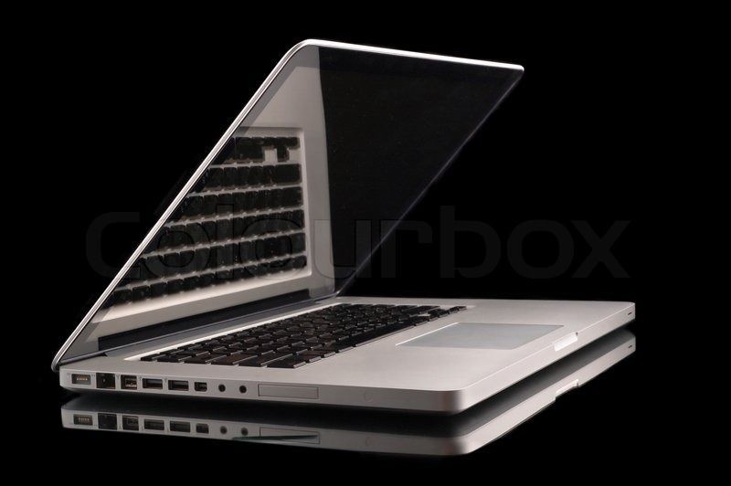 Aluminium laptop with desktop on black background | Stock Photo ...