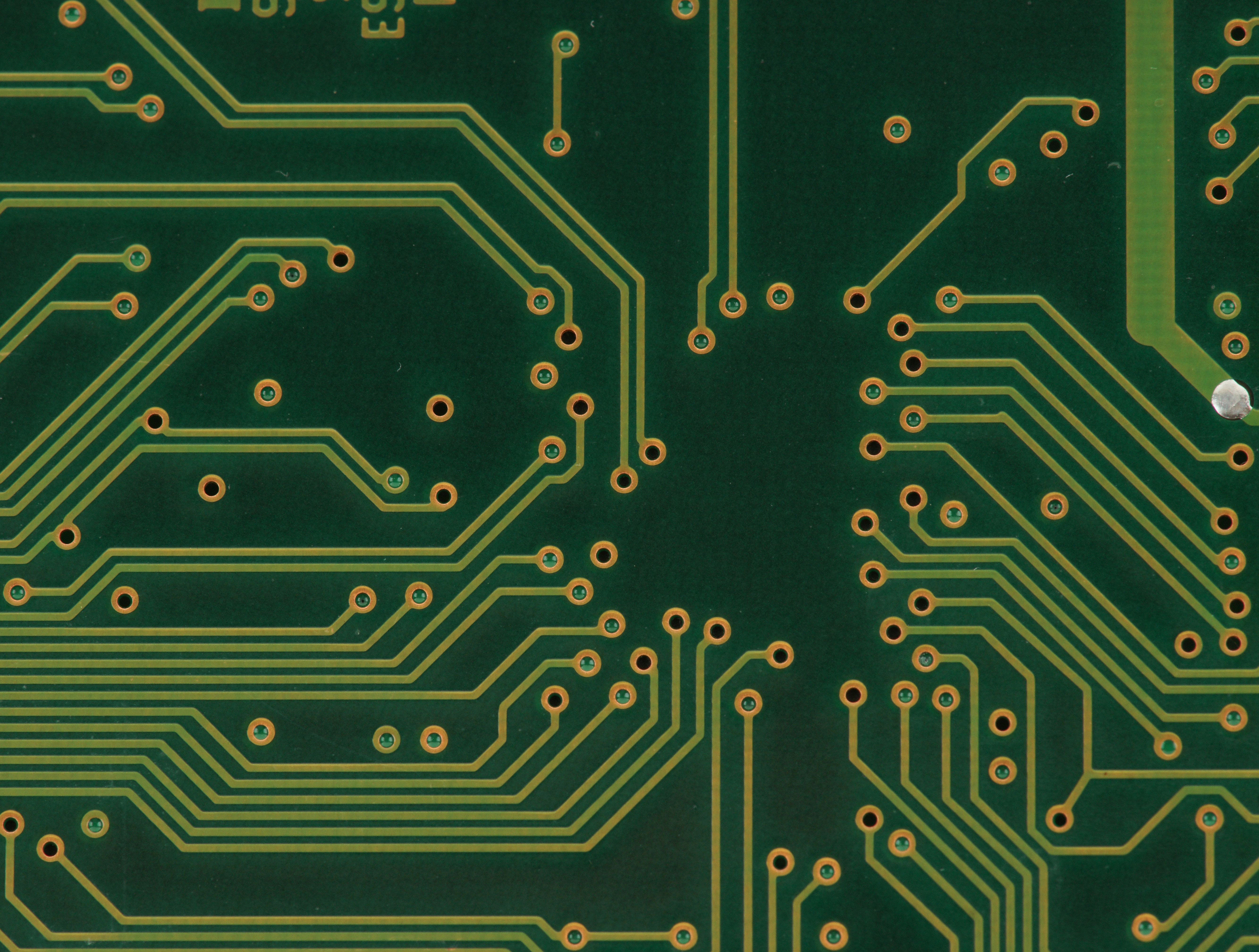Photo of a Green PCB Printed Circuit Board Texture Background