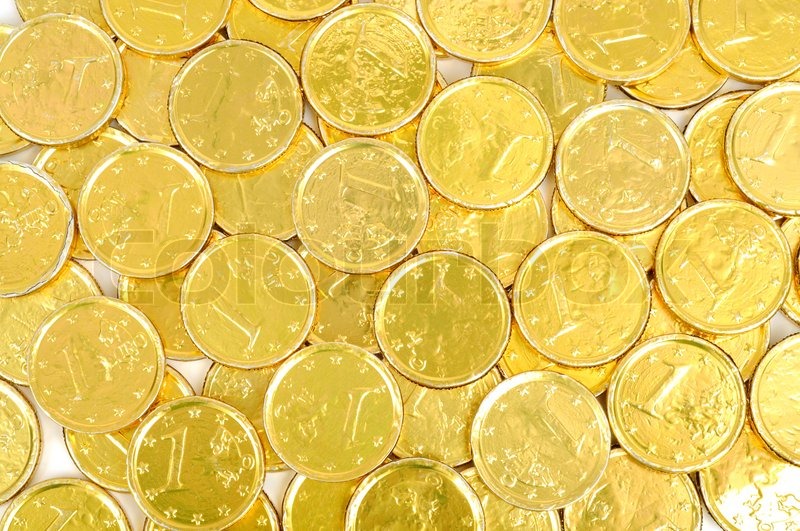 Gold coins of one euro background, isolated on white stock photo