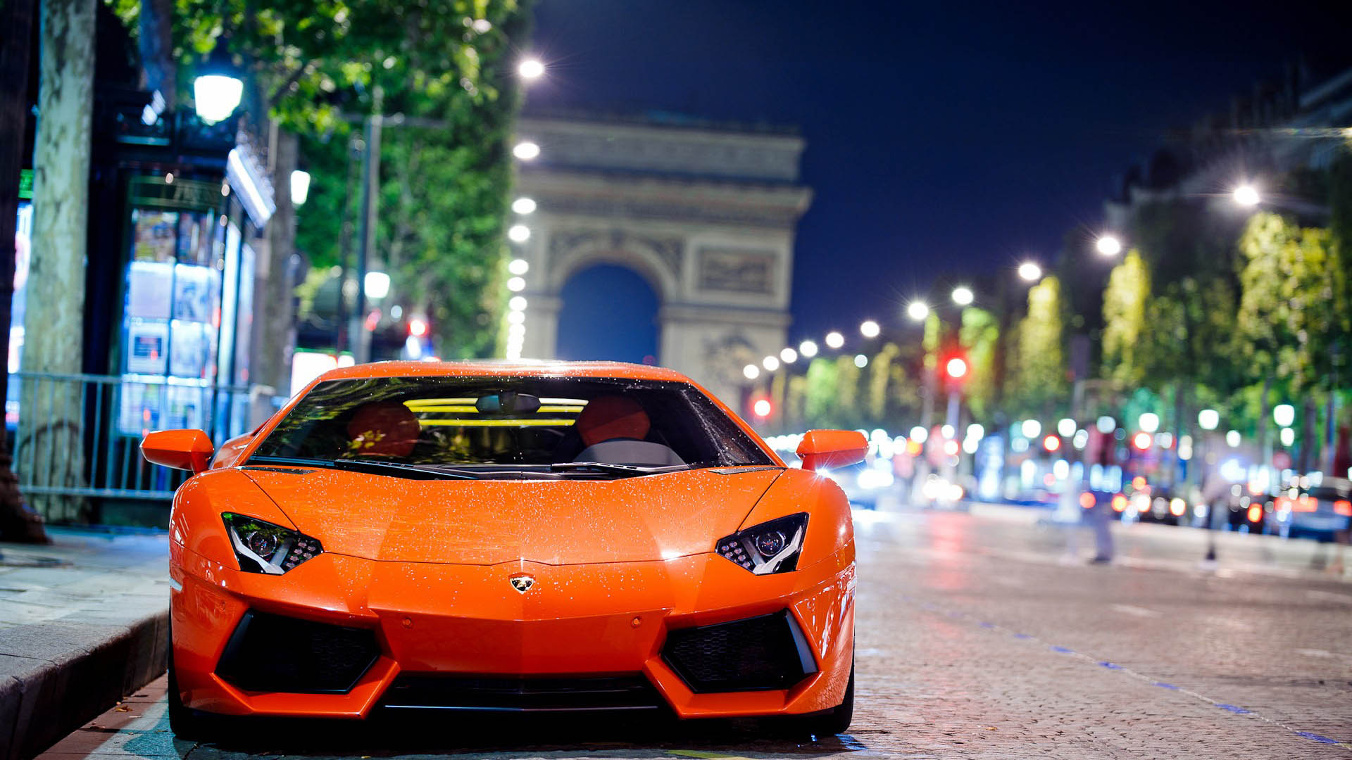 Classic Orange Lamborghini Aventador near the Arc de Triomphe ...