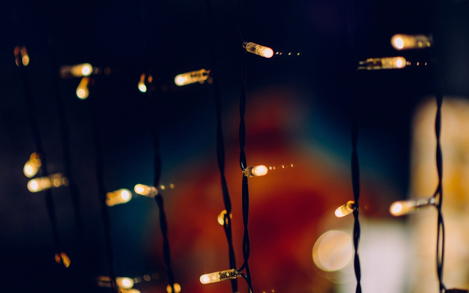 holiday new year garland decoration light bulbs blur background ...