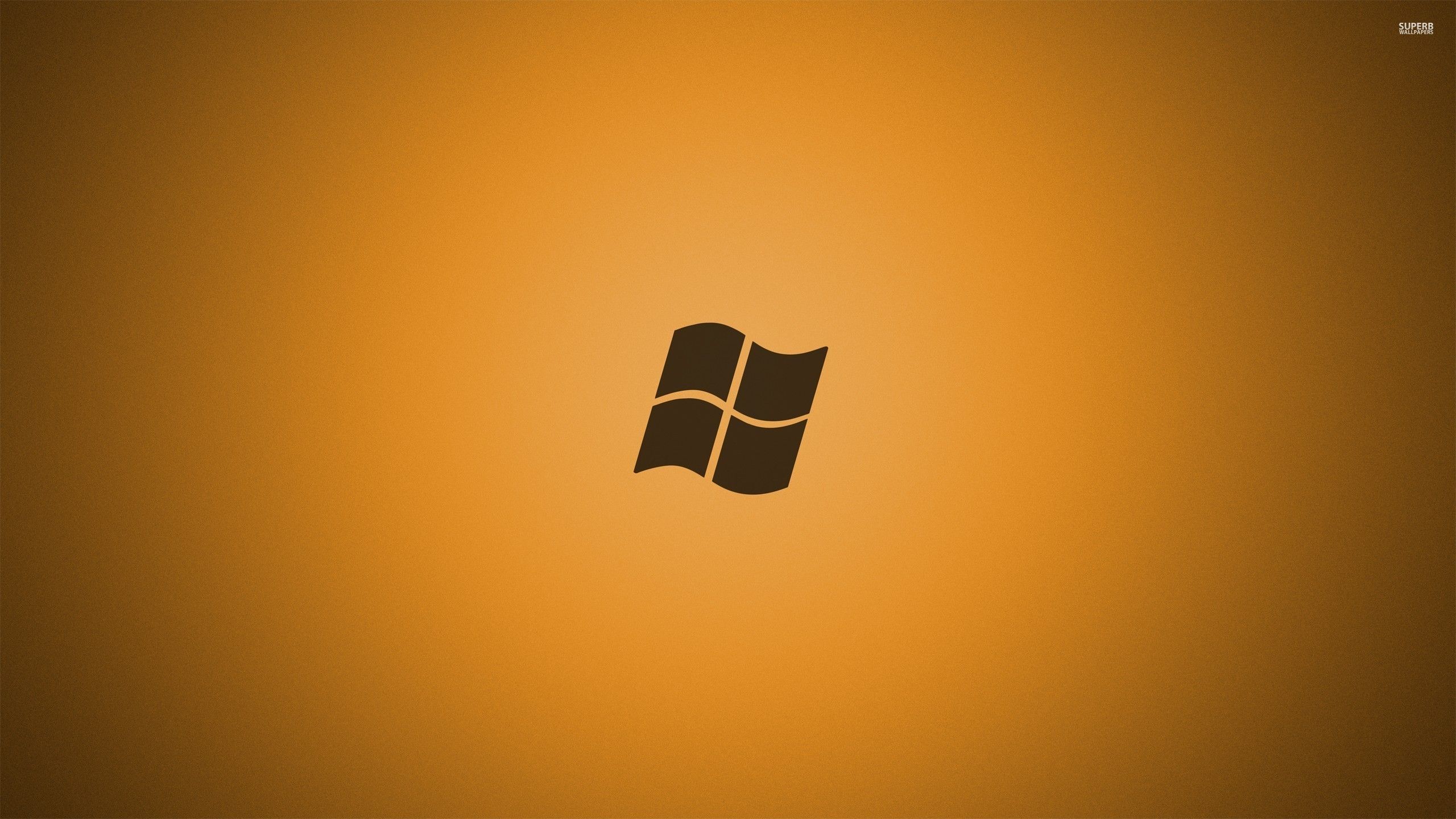 Windows 7 logo on golden background 51081 2560x1440