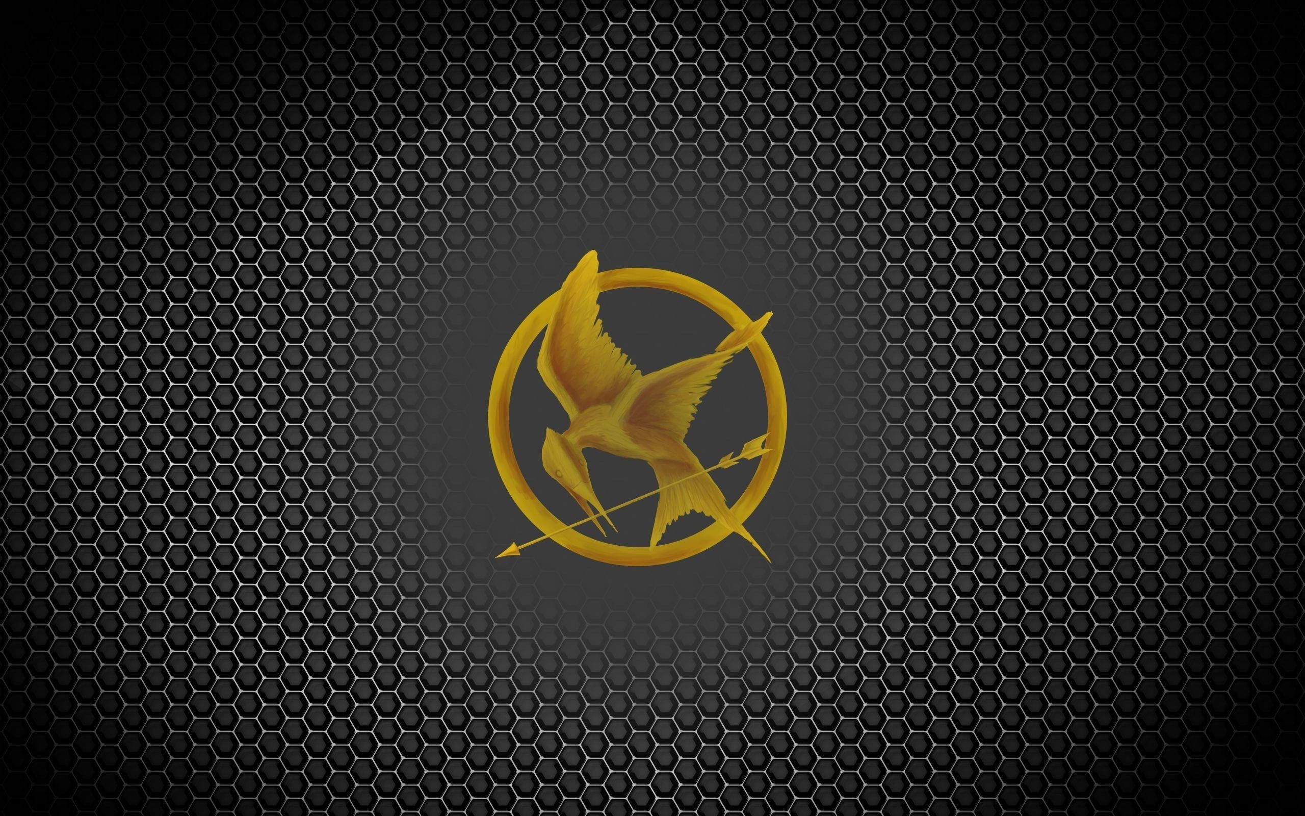 The Hunger Games Mockingjay Wallpaper logo