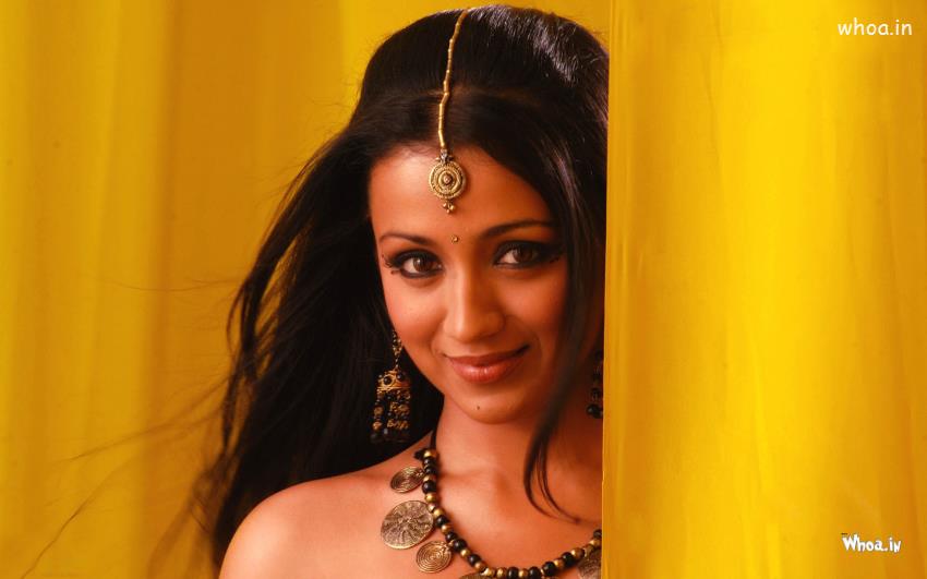 Trisha-Krishnan-Smiley-Face-with-Yellow-Background-HD-Wallpaper.jpg