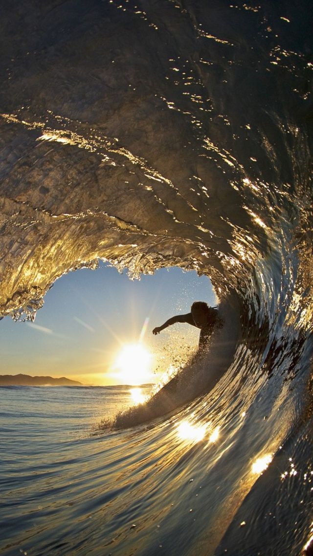 Surfer-Against-Big-Wave-640x1136.jpg