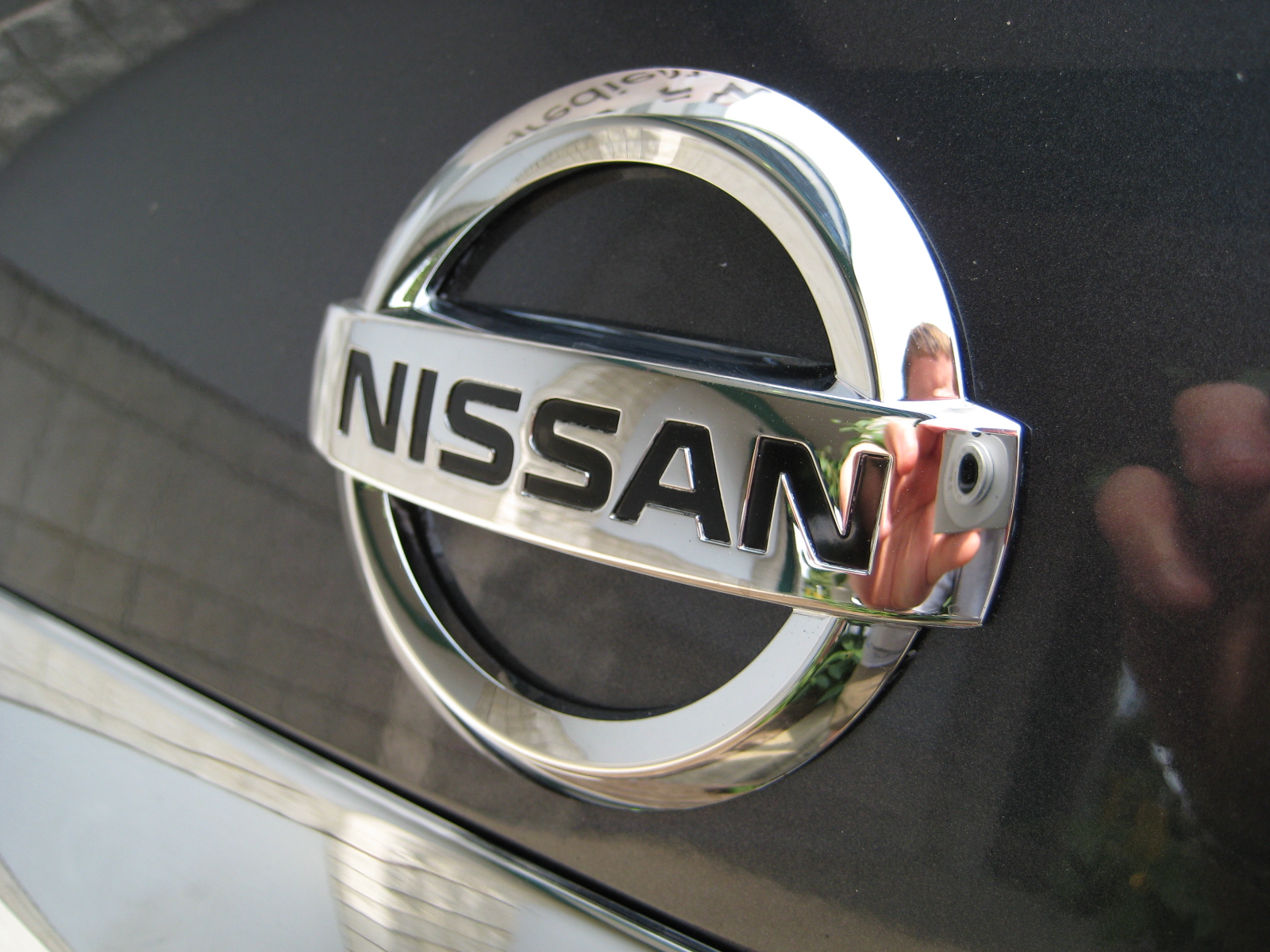 Nissan Logo, Nissan Car Symbol Meaning And History | Car Brand ...