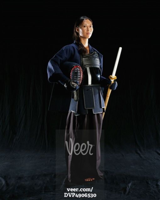 Woman wearing traditional Kendo costume Stock Photo - Veer.com