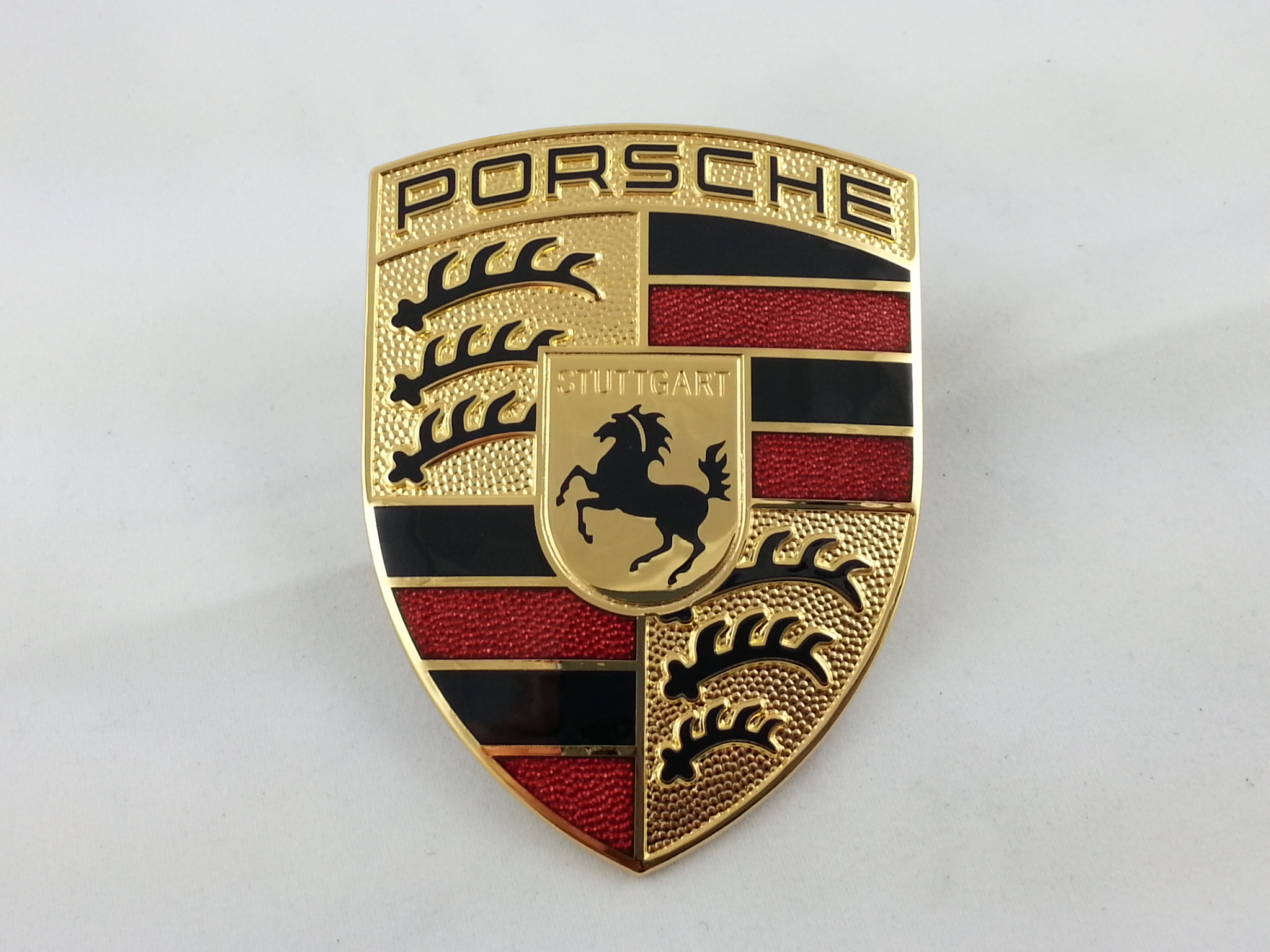 Lid emblem Information available made by Porsche. #99655921101