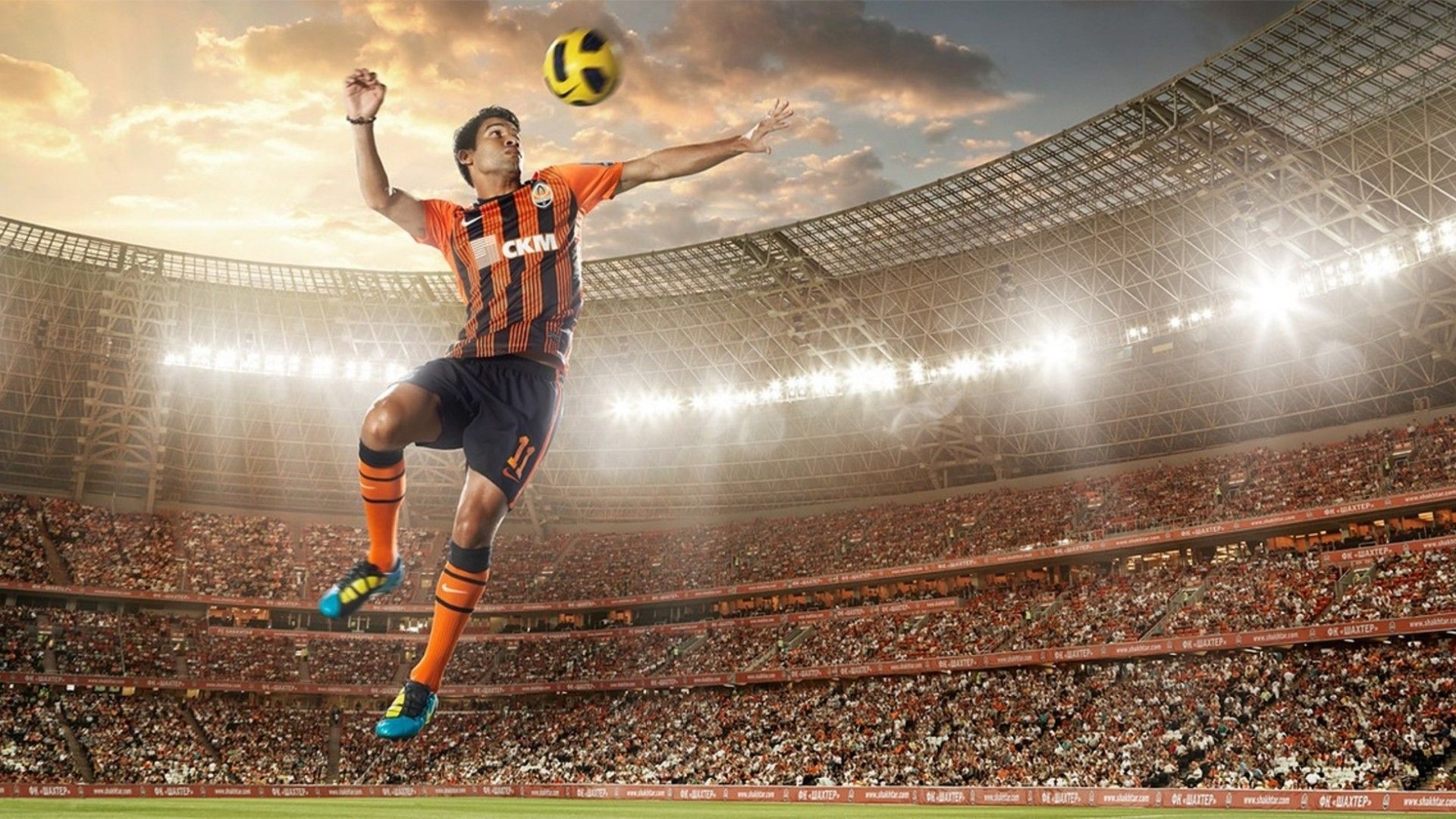 Soccer player hits the ball wallpapers and images - wallpapers ...