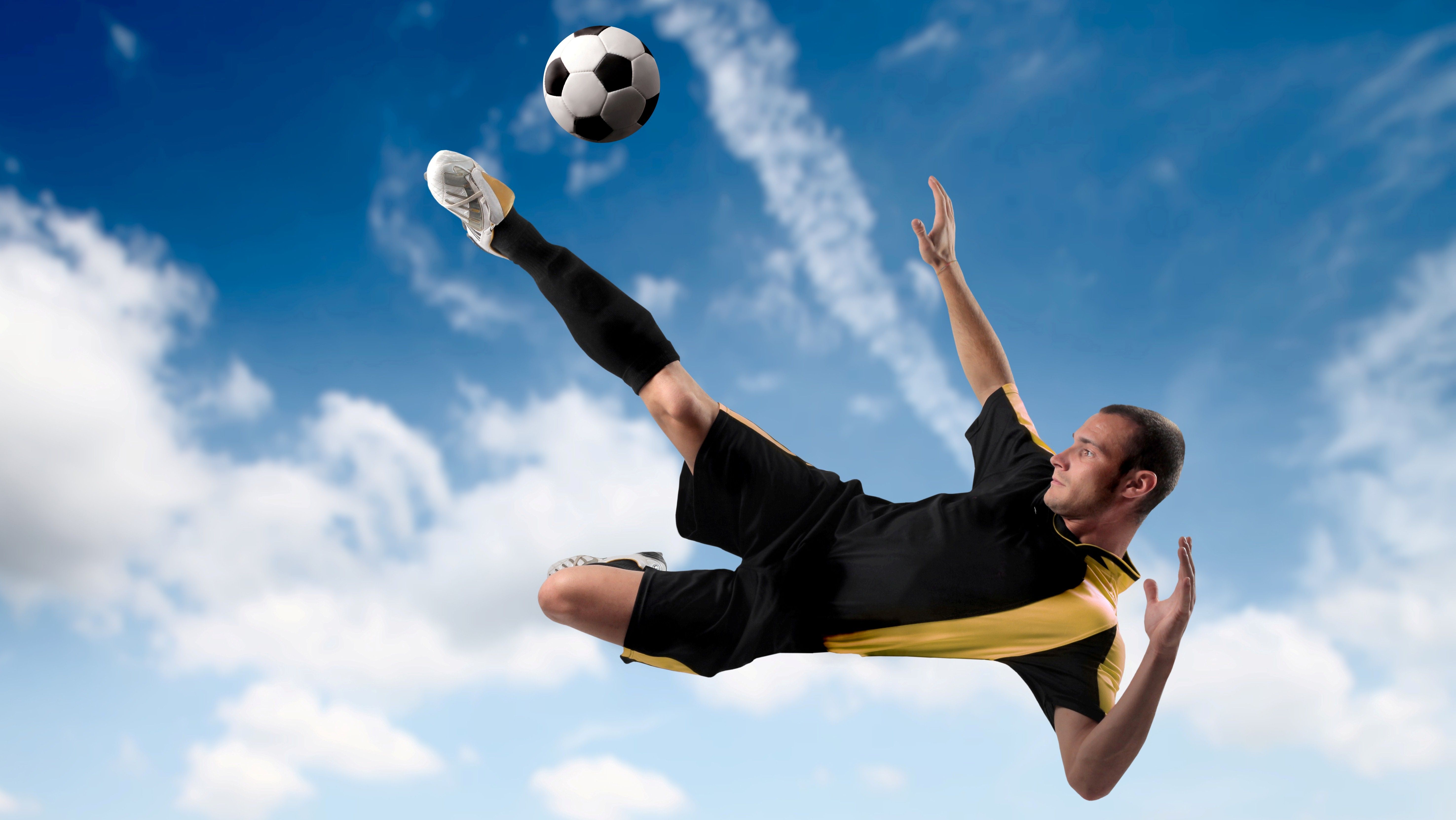 Super Hit in Air By Football Player in Soccer Sport Game Photo ...