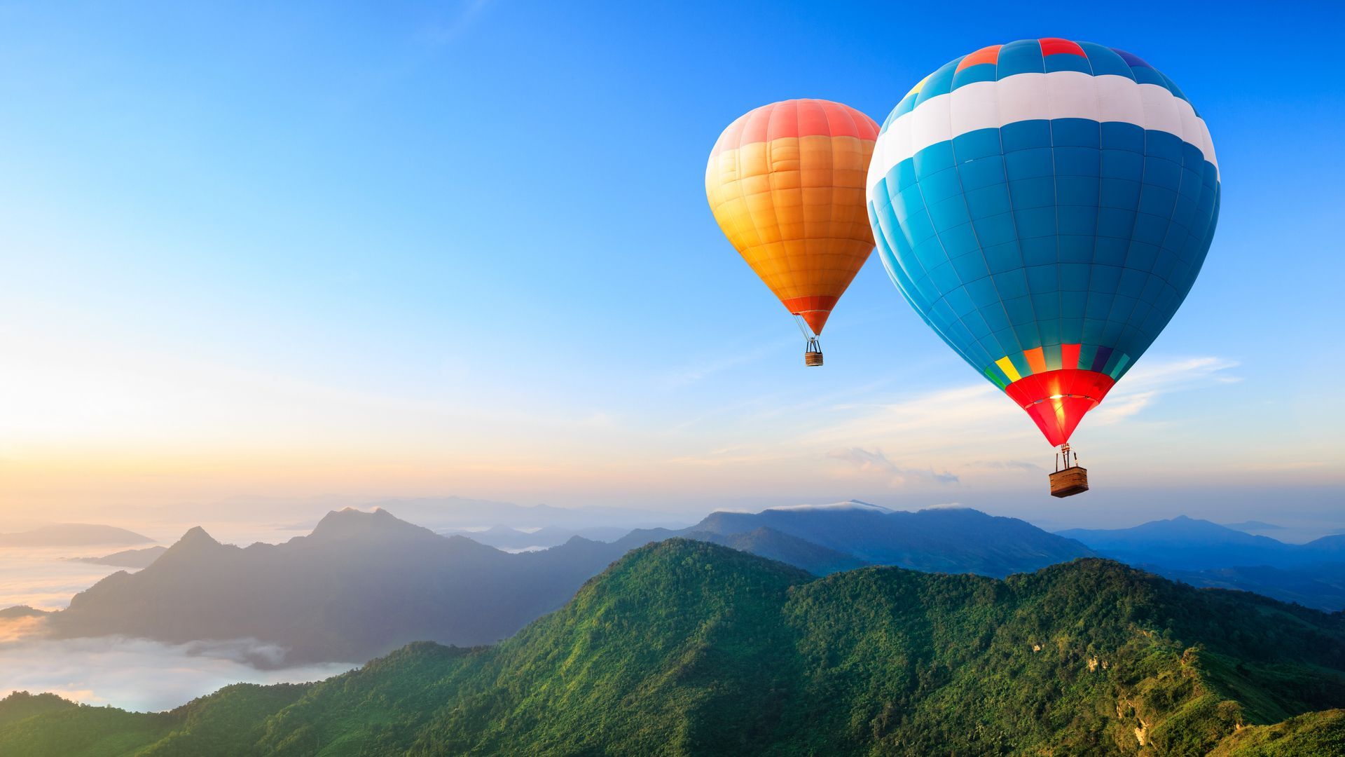 Colorful hot-air balloons flying over the mountain 4K Ultra HD ...