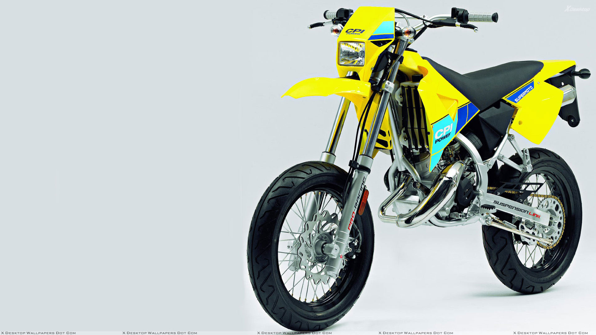 CPI Supermoto 50 in Yellow Front Side Pose Wallpaper