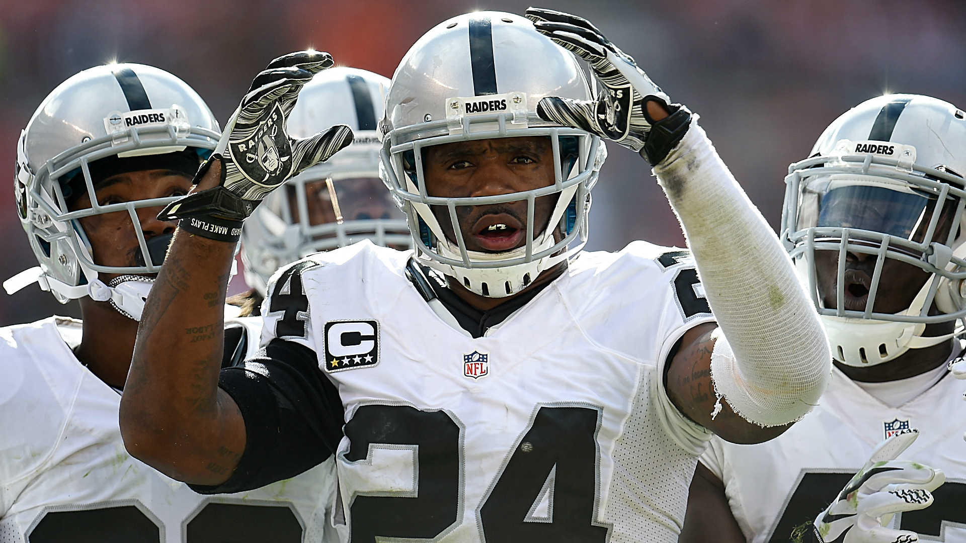Charles Woodson's kids demanded an interception, and he delivered