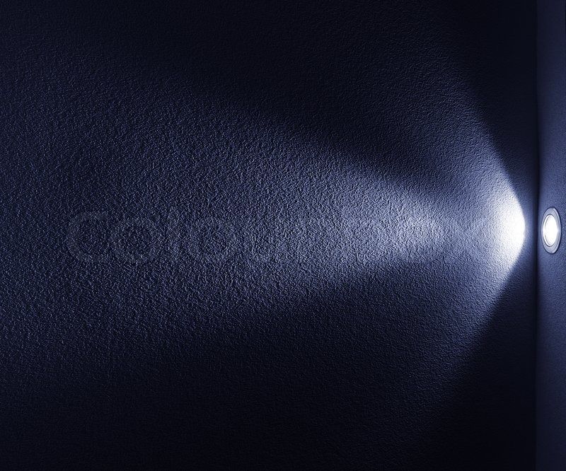 Blue Light Beam from Projector on Black Background stock photo