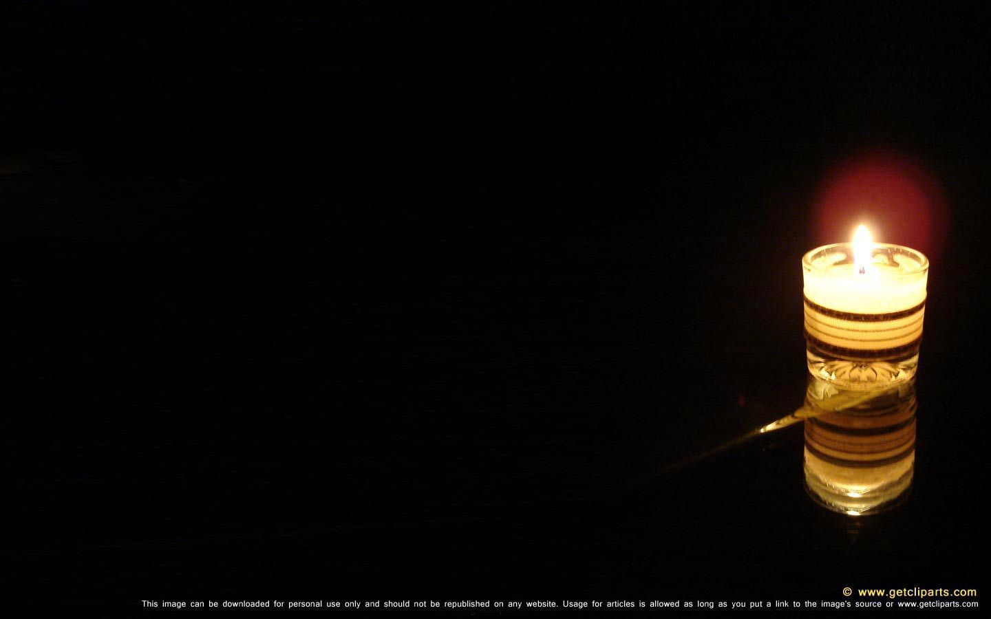 Candle light in black background for powerpoint and desktop ...