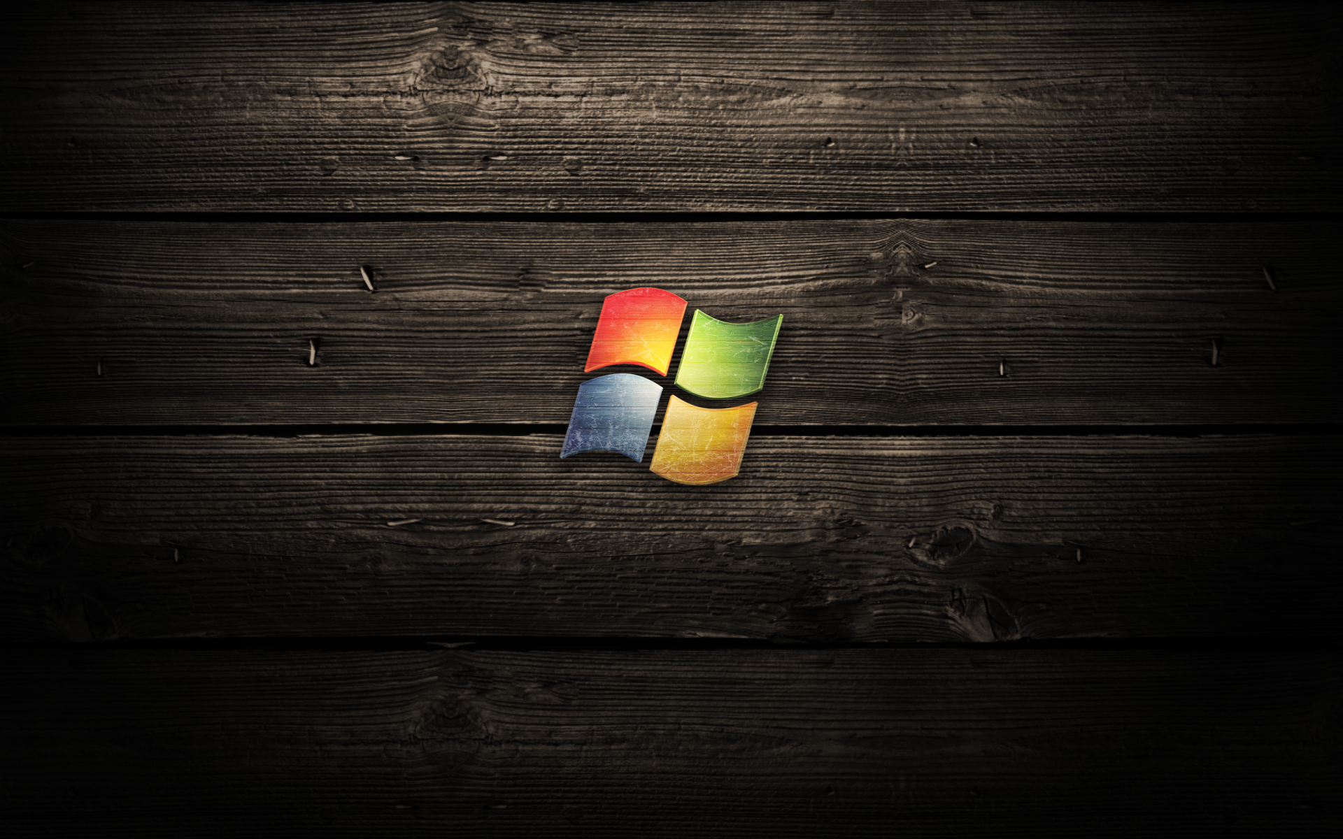 Windows 7 on the wood desktop wallpaper 23579