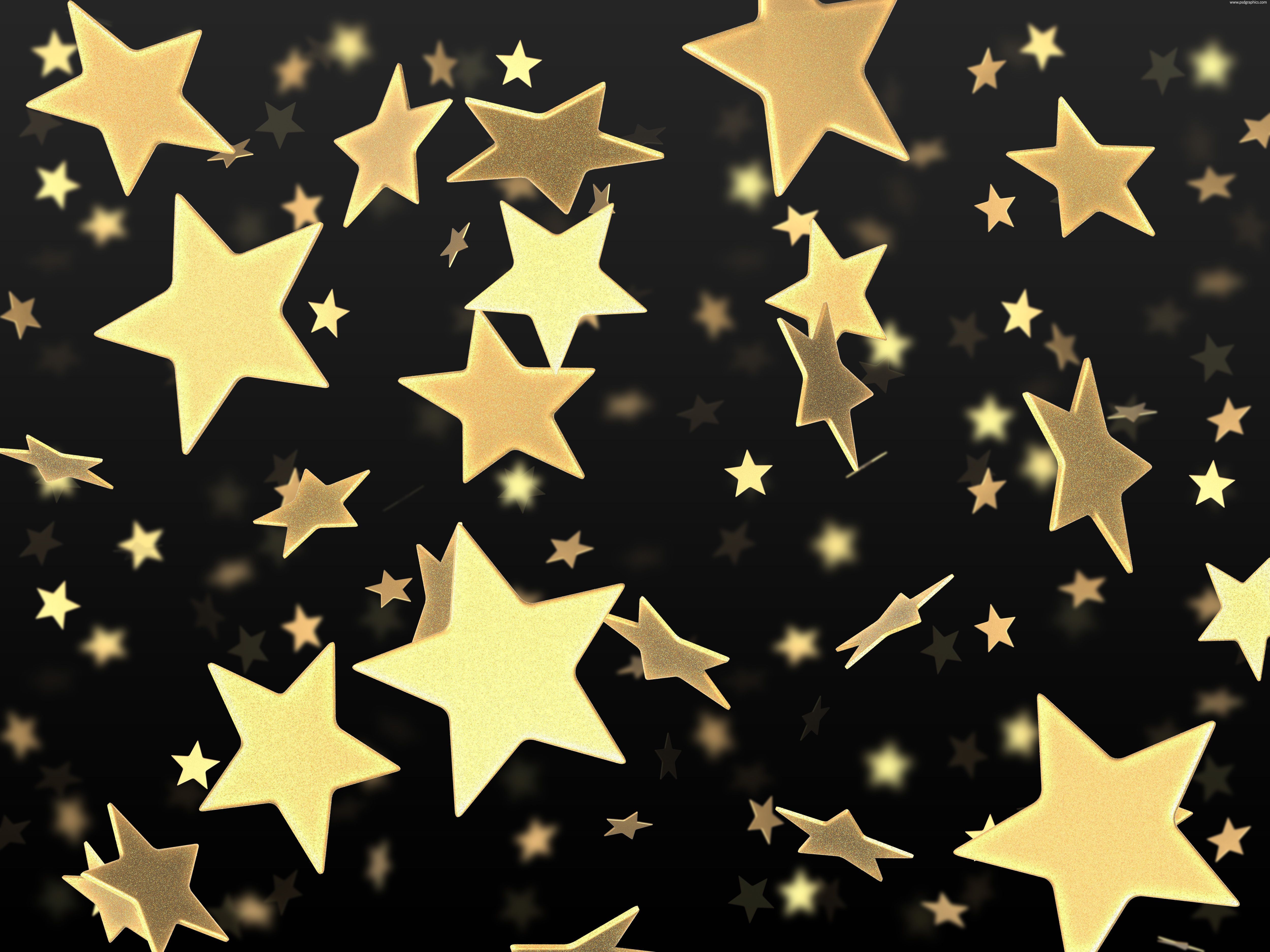 Golden stars on black background | PSDGraphics
