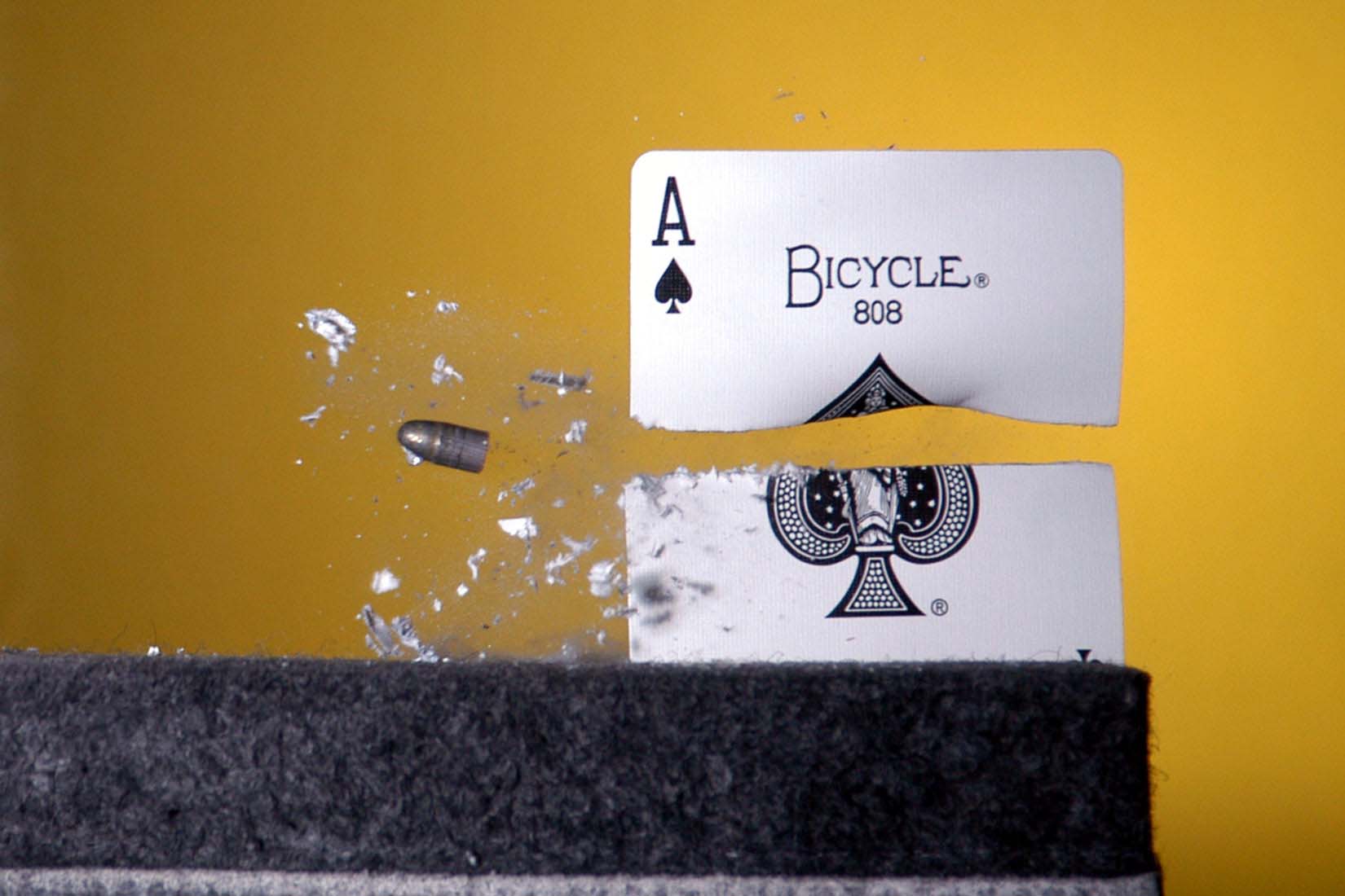 Amazing Slow Motion Gun Bullets Shoot Playing Cards Wallpaper