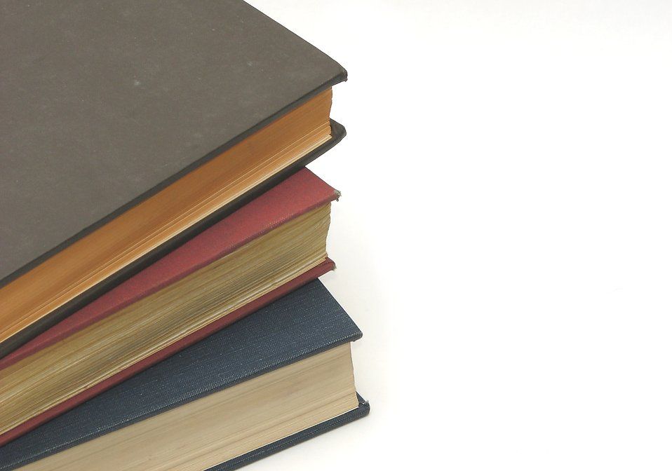 Books Free Stock Photo A stack of books isolated on a white