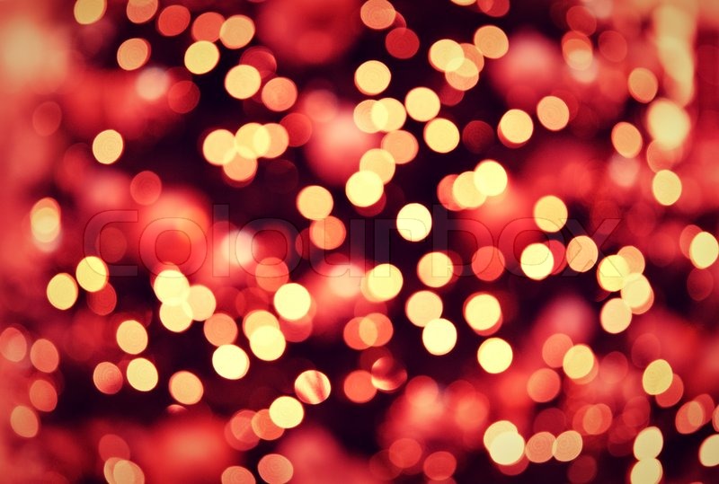 Red golden Christmas lights background with bokeh Stock Photo
