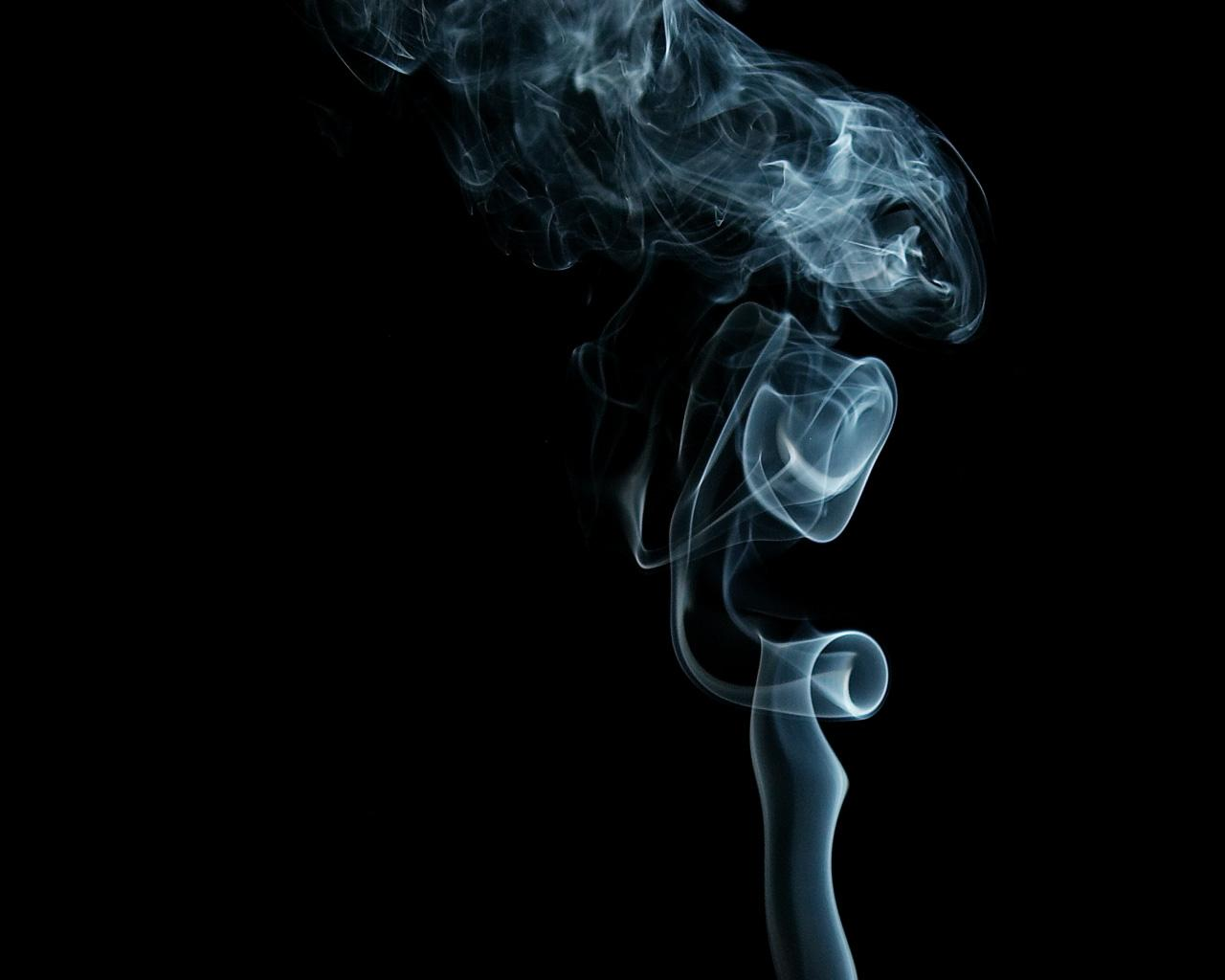 Colorful smoke trails in black background HD Wallpaper
